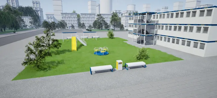 A three-storey building assembled from white and blue Condecta modules with an outside staircase, next to a lawn with a playground, benches and trees